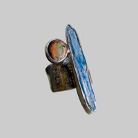 Ring with gemstones on a neutral background