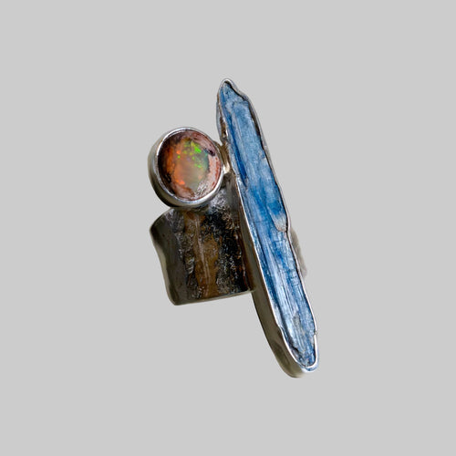 Ring with gemstones on a neutral background