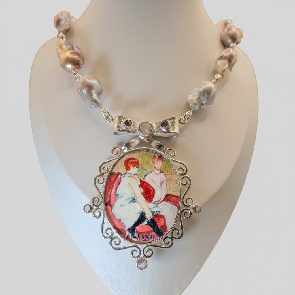 Necklace with a heart-shaped pendant on a mannequin bust against a plain background
